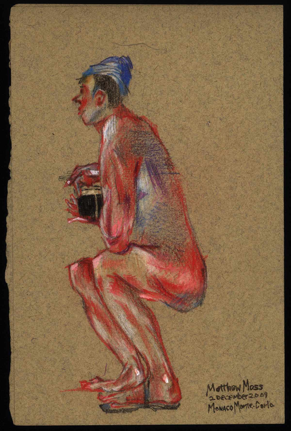 Seated stout drinker wearing a cap